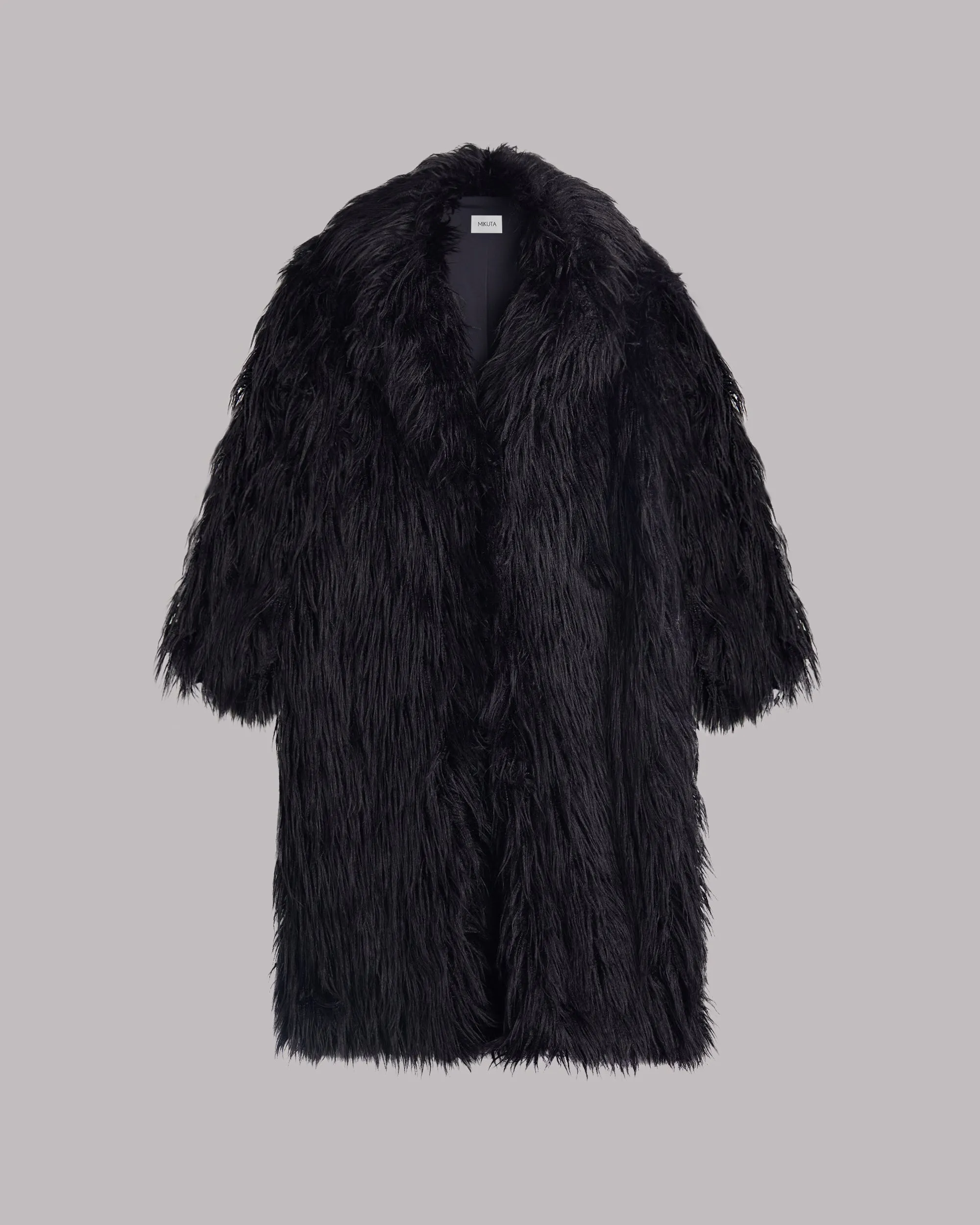 The Black Fluffy Coat